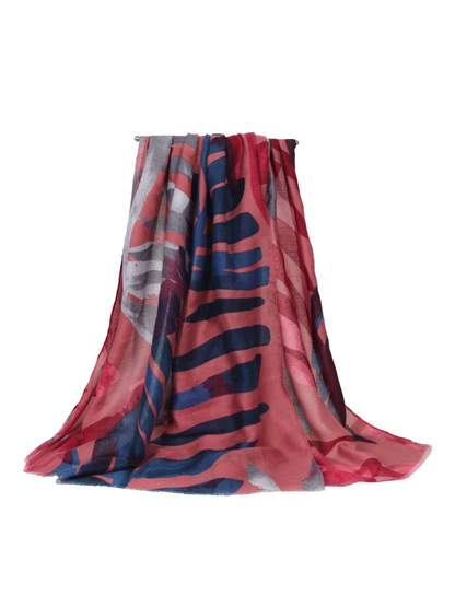 Dusty pink abstract scarf with navy and gray accents, draped view