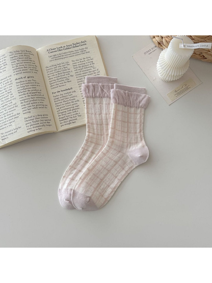 Light pink grid-check socks with gathered cuffs