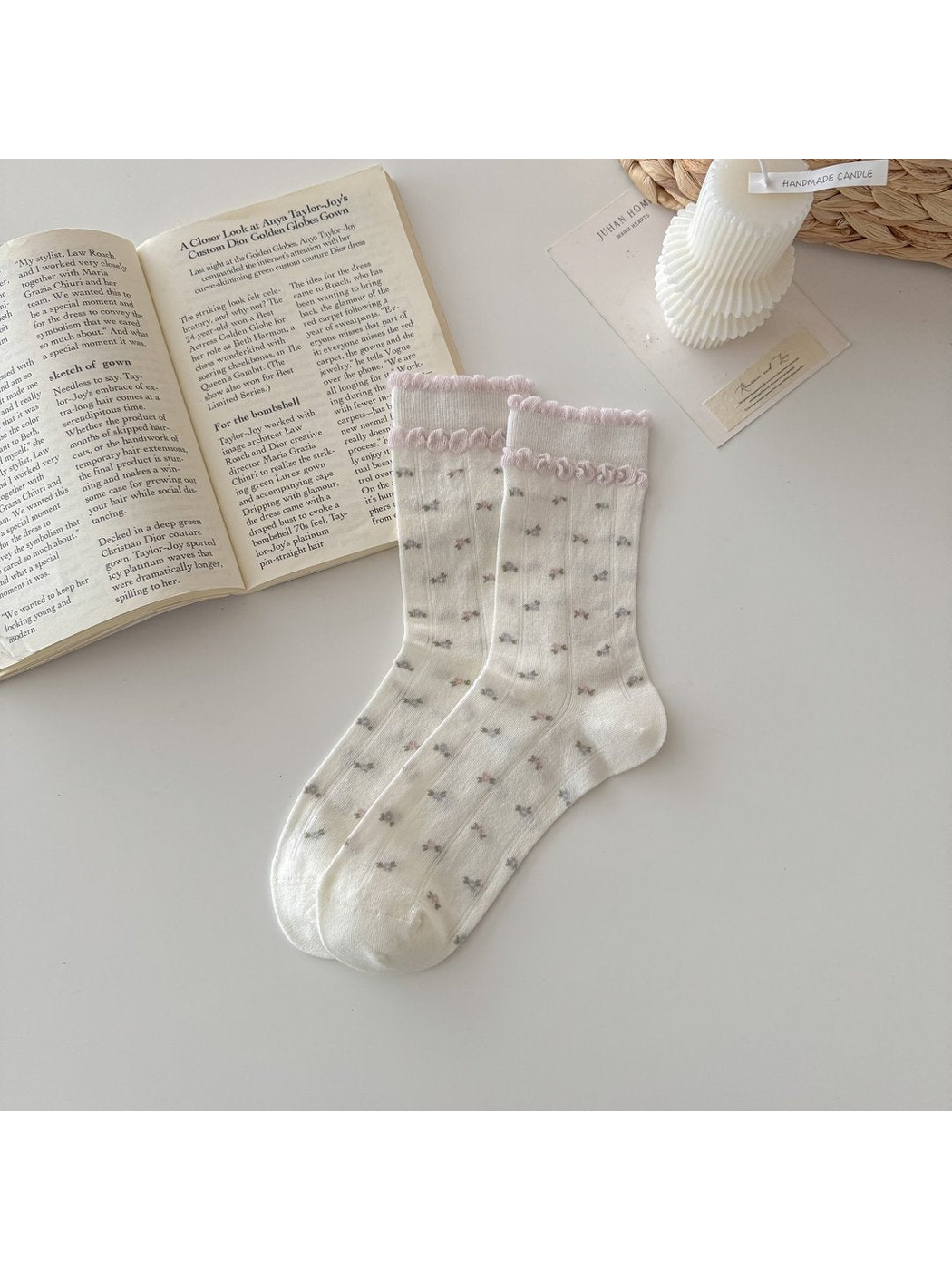 Ivory socks with tiny floral motifs and looped cuff trim