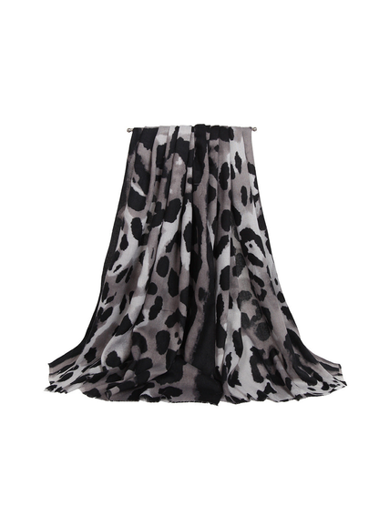 Gray and black animal-print rectangular scarf, draped view