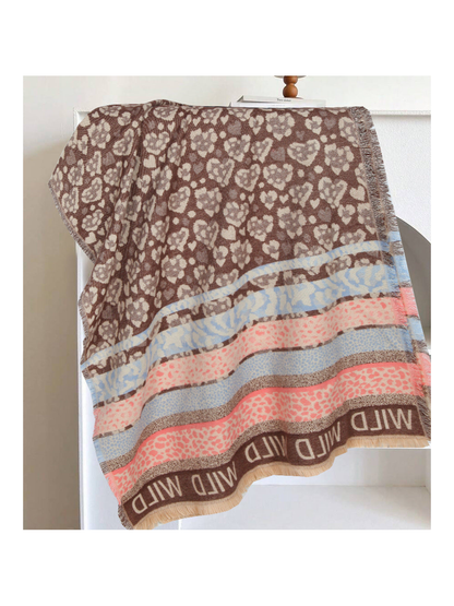 Brown rectangular scarf with blue and pink patterned bands and fringed edges