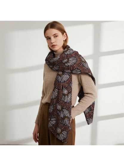 Brown fan-pattern scarf wrapped around the neck and shoulders
