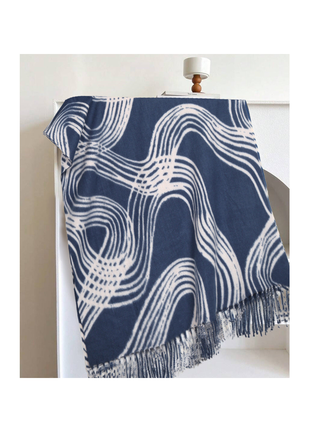 Blue rectangular scarf with abstract light lines and fringe