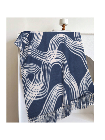 Blue rectangular scarf with abstract light lines and fringe