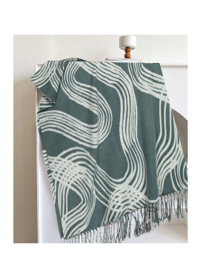 Green rectangular scarf with abstract light lines and fringe