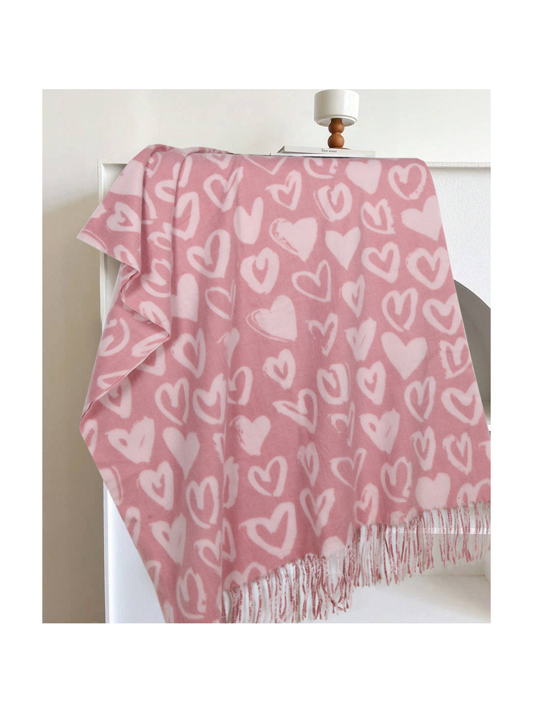 Pink scarf with pale heart pattern and fringed edge