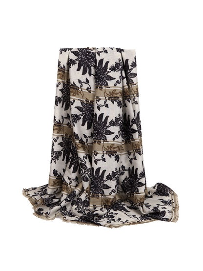 Beige scarf with black floral and animal motifs and taupe border bands