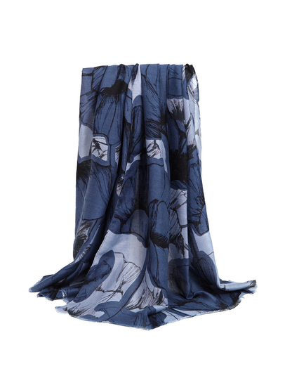 Blue oversized floral scarf with fringed ends, draped view