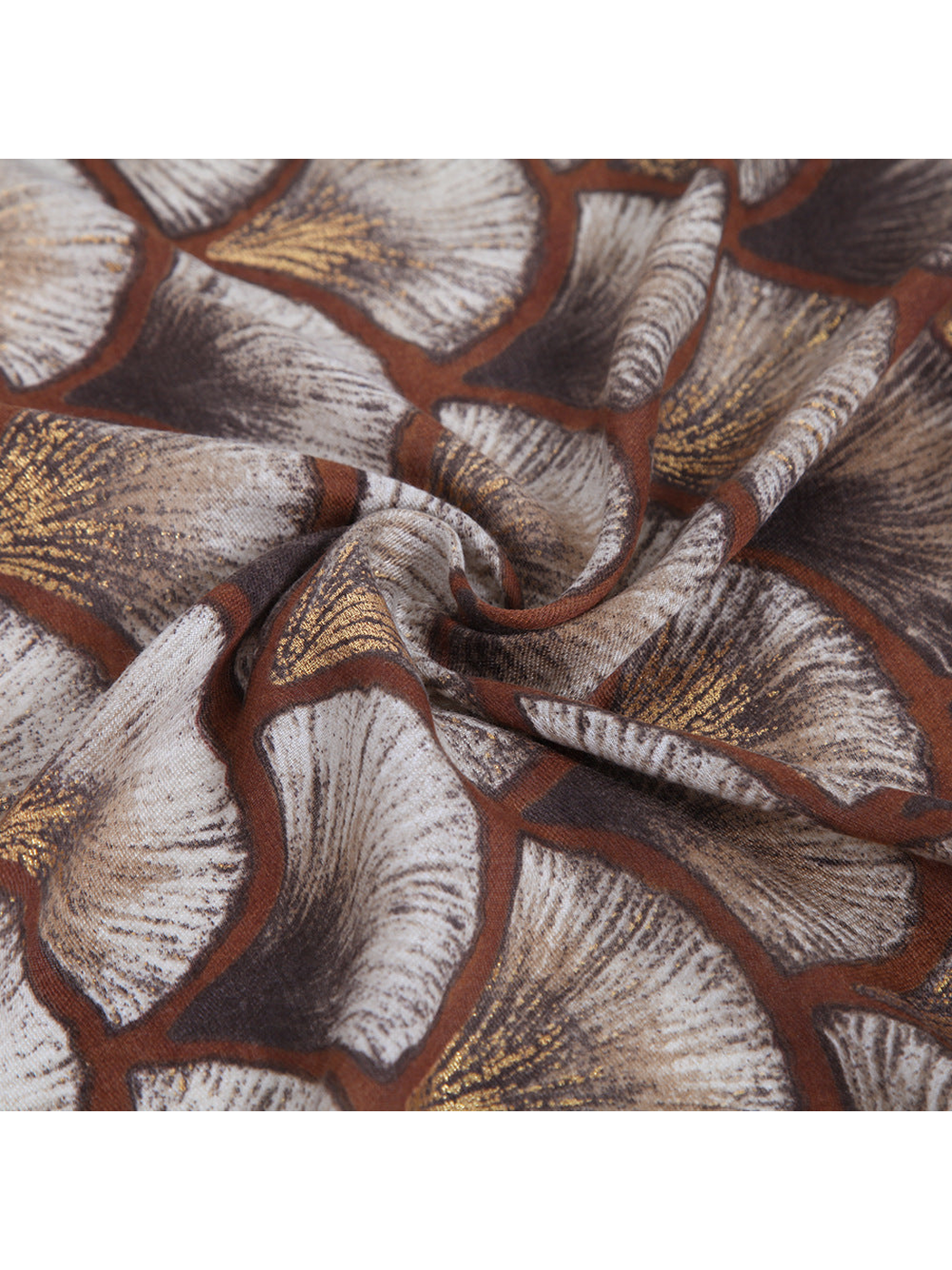 Close-up of the ginkgo-leaf pattern with metallic-look gold accents