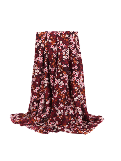 Burgundy and pink floral rectangular scarf in a full draped view
