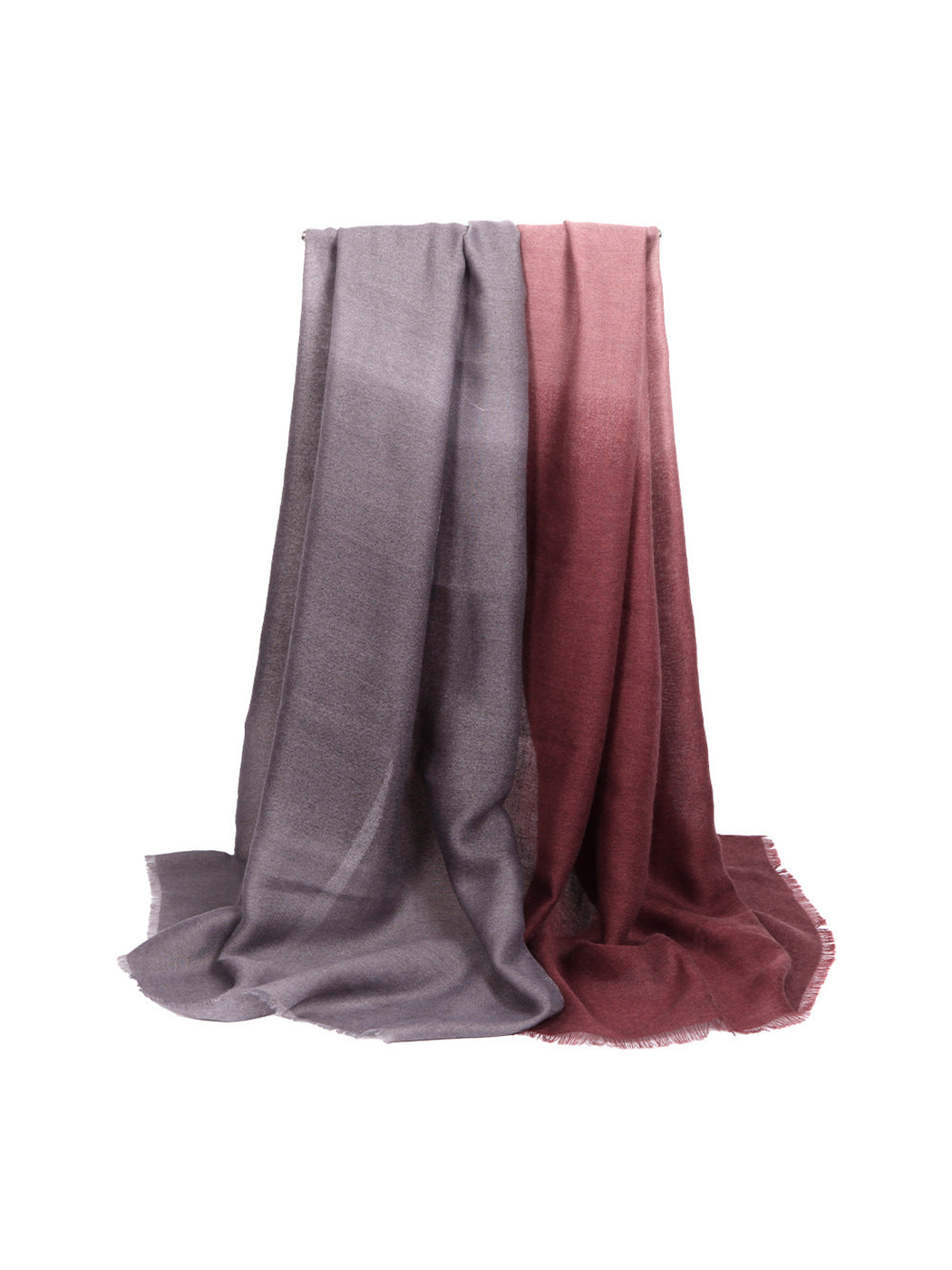 Purple and burgundy ombre scarf draped against a white background