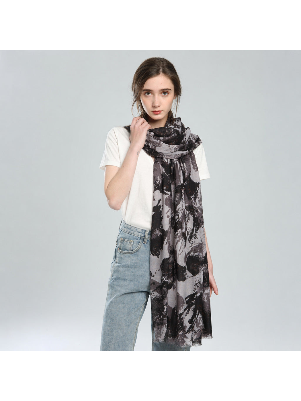 Gray and black abstract floral scarf worn with long front panels