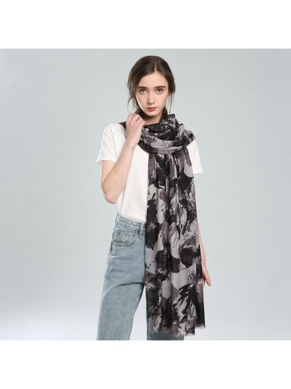 Gray and black abstract floral scarf worn with long front panels