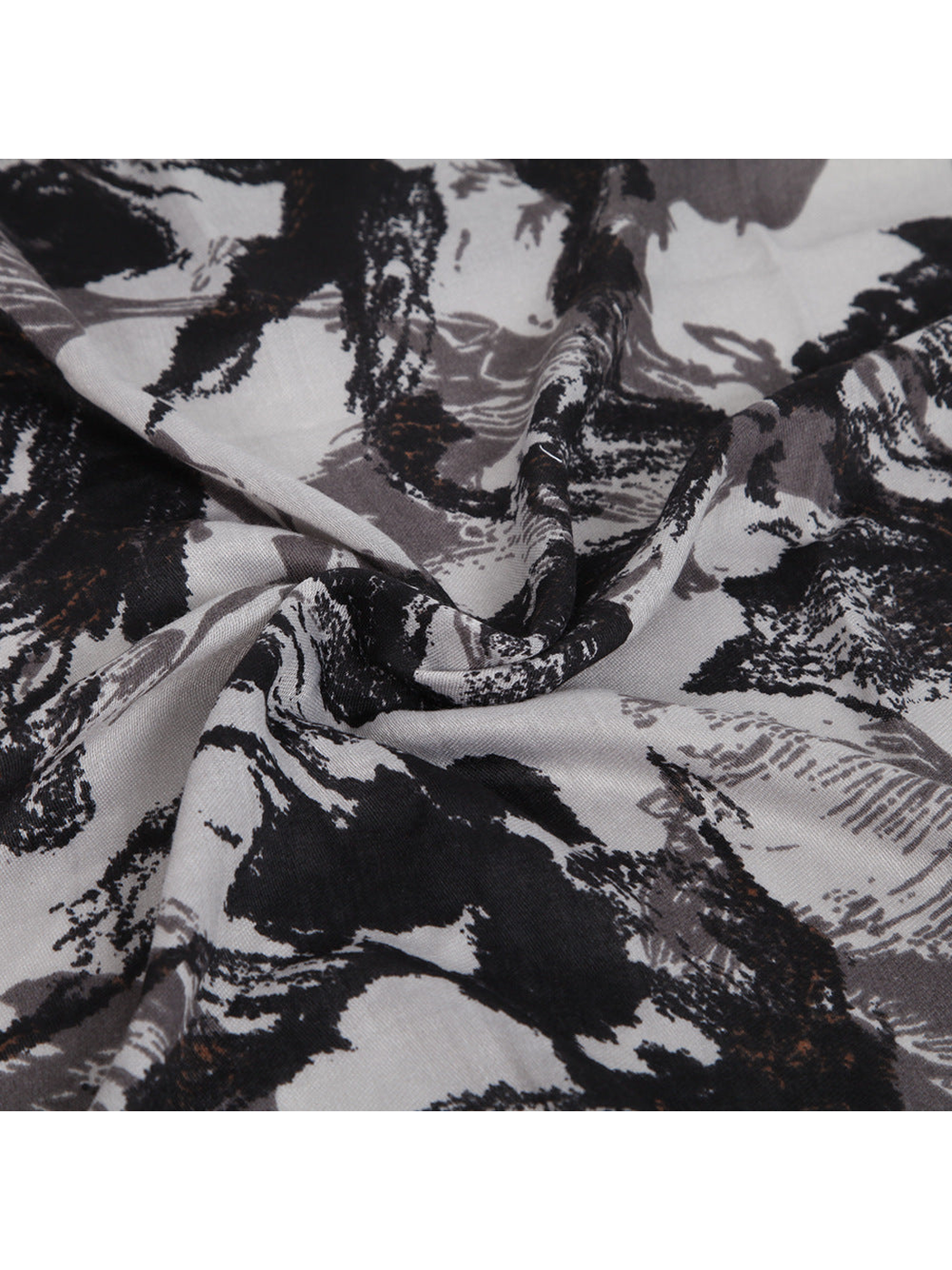 Close-up of the gray and black abstract print and fine woven texture
