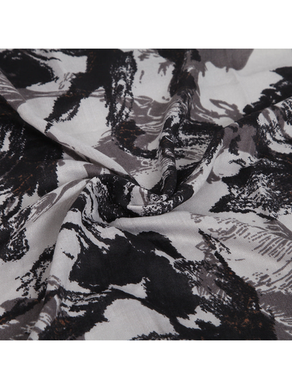 Close-up of the gray and black abstract print and fine woven texture