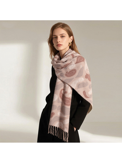 Taupe paisley scarf wrapped around the neck and draped over one shoulder