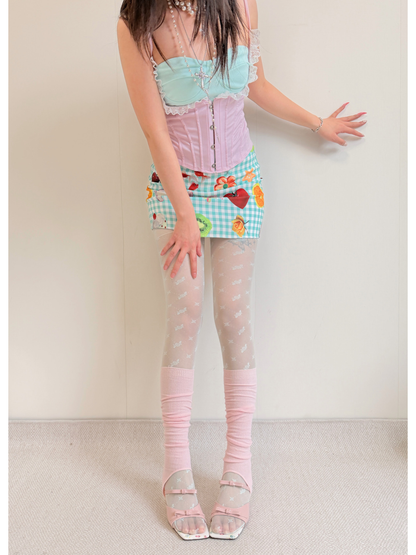 Pink ribbed knee-high open-toe socks with heel openings, full front view