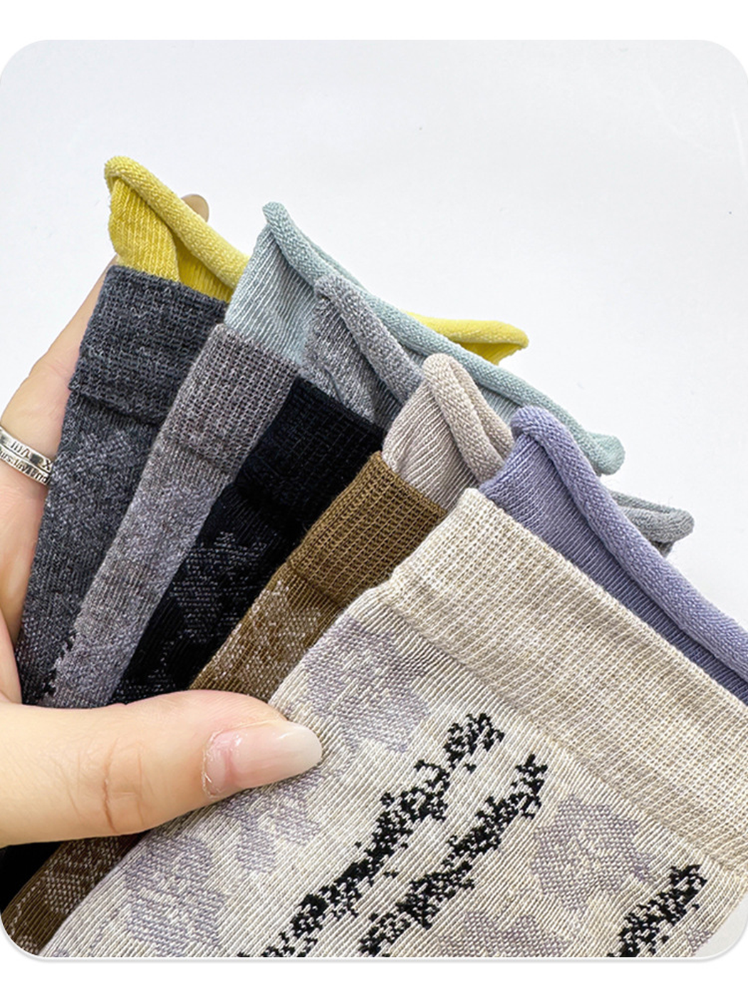 Close-up of contrasting double-layer rolled sock cuffs