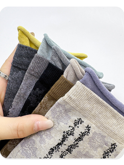 Close-up of contrasting double-layer rolled sock cuffs