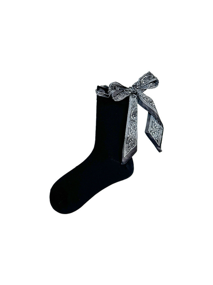 Black crew sock with a paisley ribbon bow