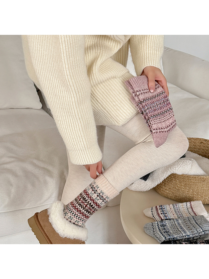 Ivory geometric crew socks styled with additional patterned colors nearby