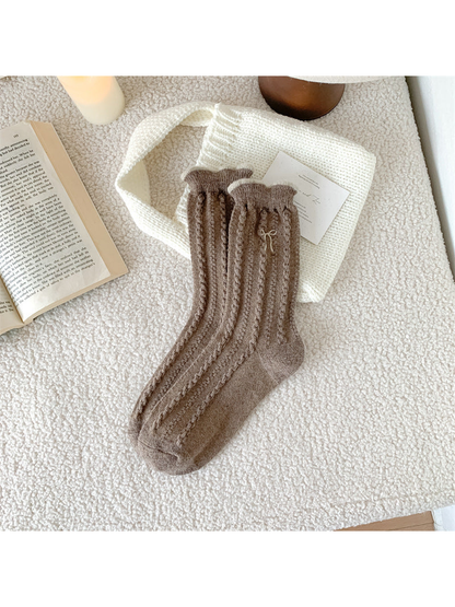 Light brown cable-knit crew socks with bow embroidery