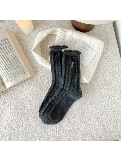 Dark gray cable-knit crew socks with bow embroidery