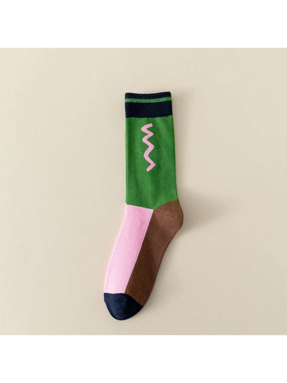 Green color-block crew sock with pink zigzag and navy trim