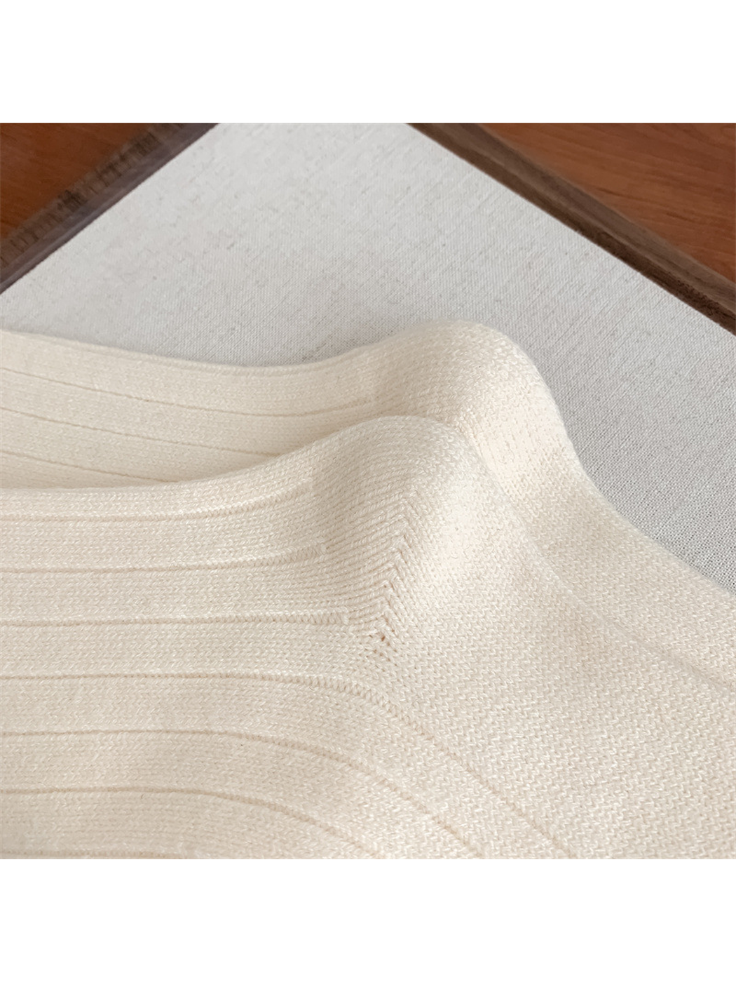 Close-up of the shaped heel and ribbed knit pattern