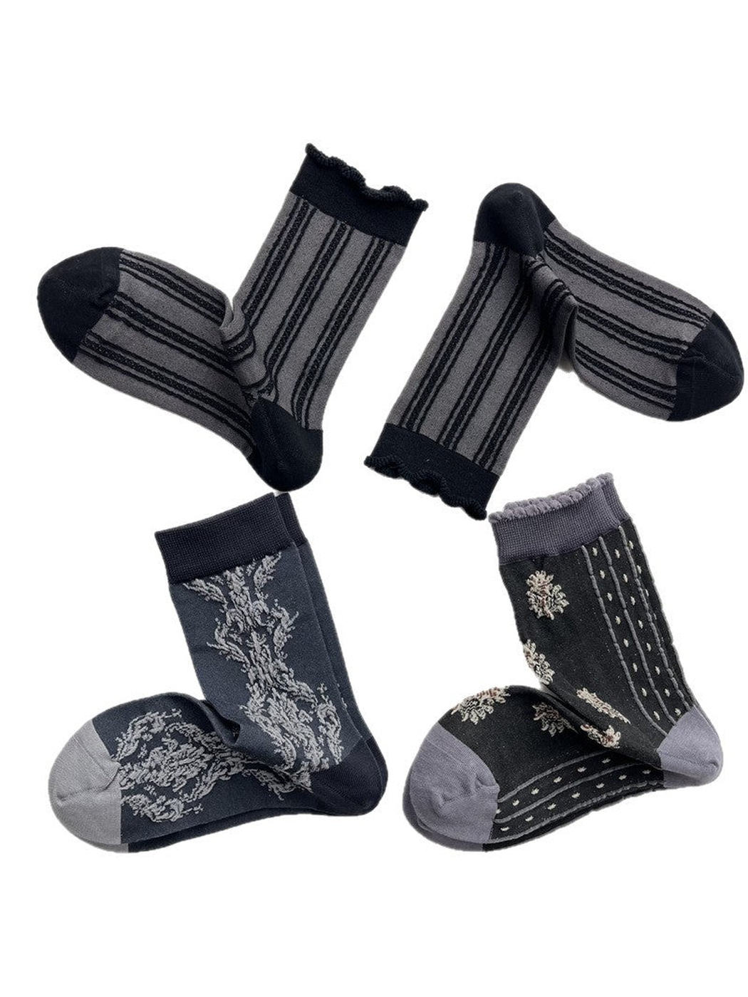 Three dark gray crew sock designs on a white background