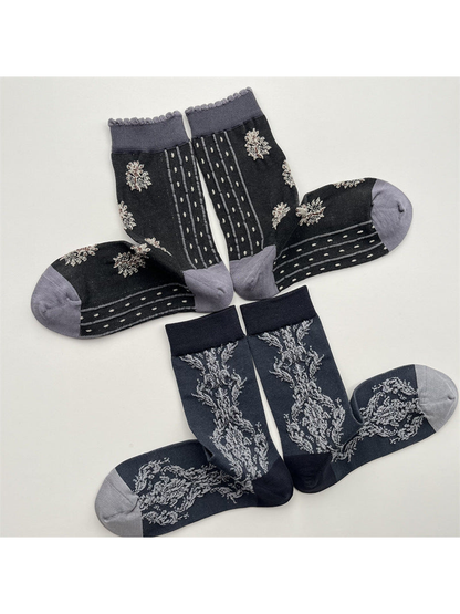 Botanical and floral-dot crew socks displayed in pairs