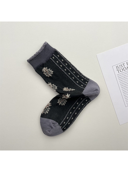 Dark gray floral-dot crew socks with dotted side stripes