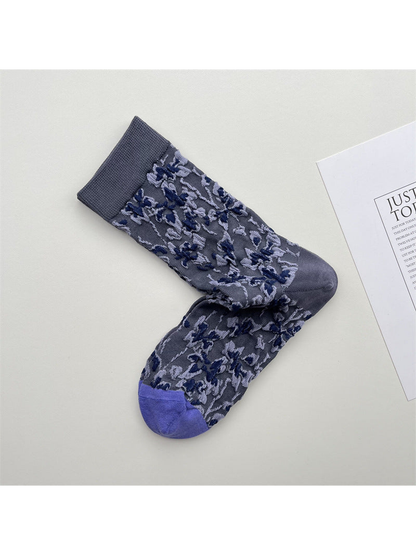 Blue-gray floral crew socks with a gray cuff and purple toe