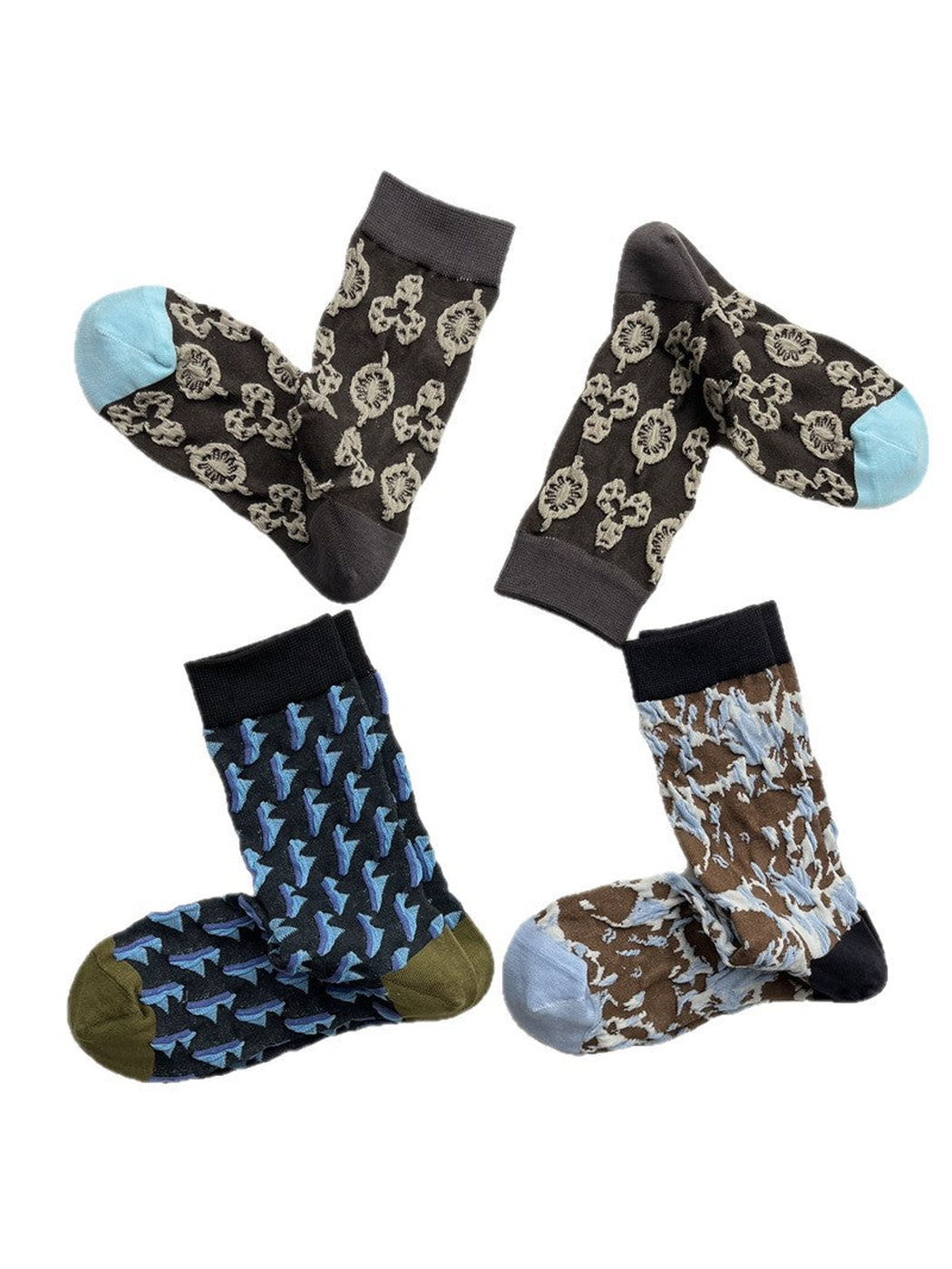 Three patterned crew sock designs arranged on a white background