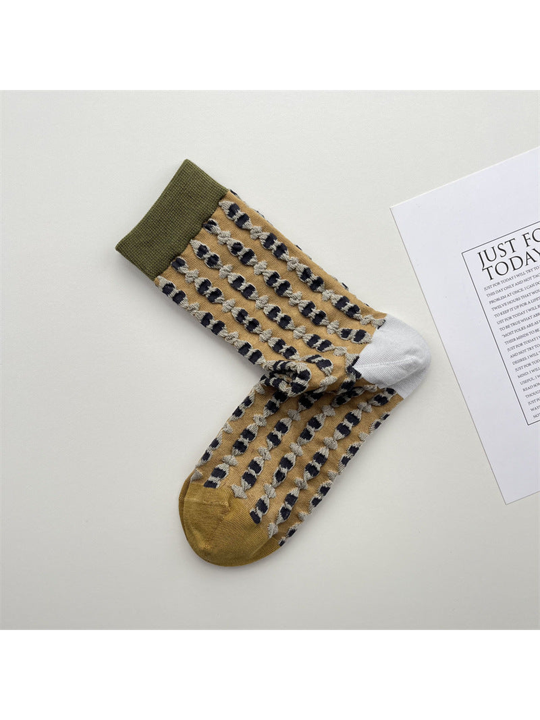 Mustard geometric crew socks with green cuffs and contrasting toes