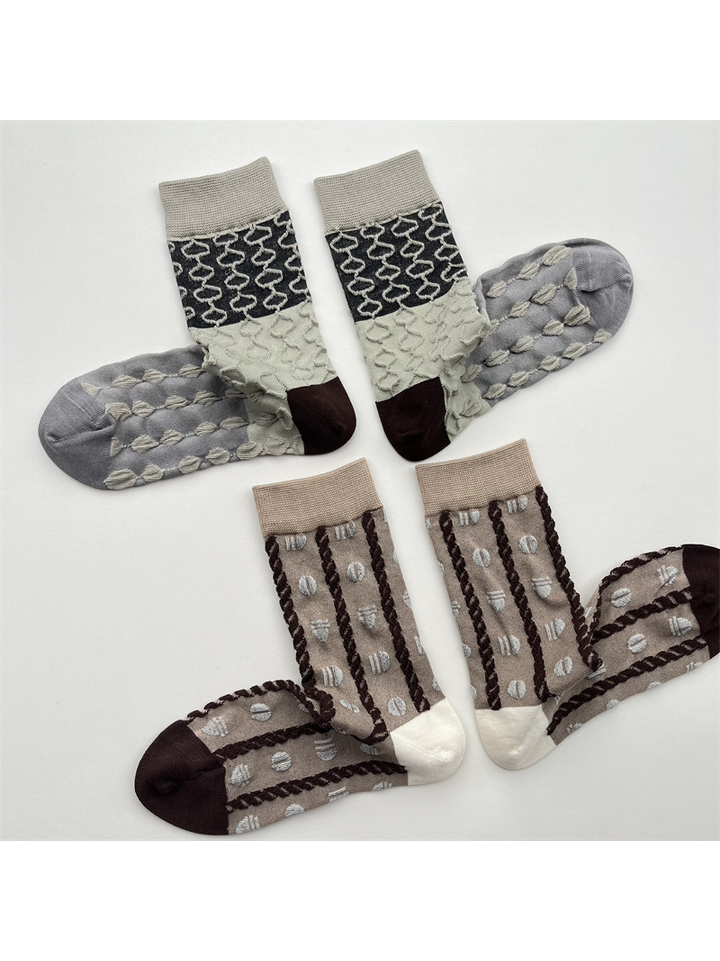 Khaki and color-block geometric crew socks displayed in pairs