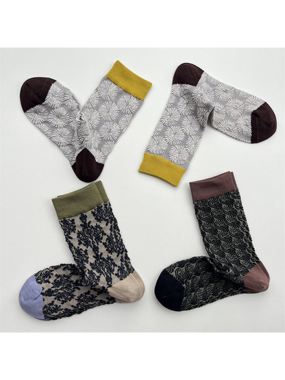 Three sheer patterned crew sock designs with contrasting cuffs and toes