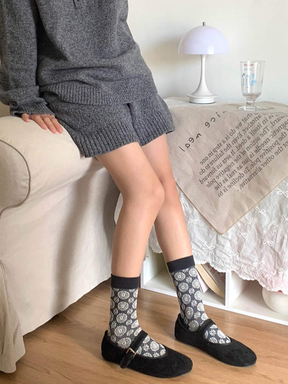 Floral medallion crew socks styled with black strap shoes