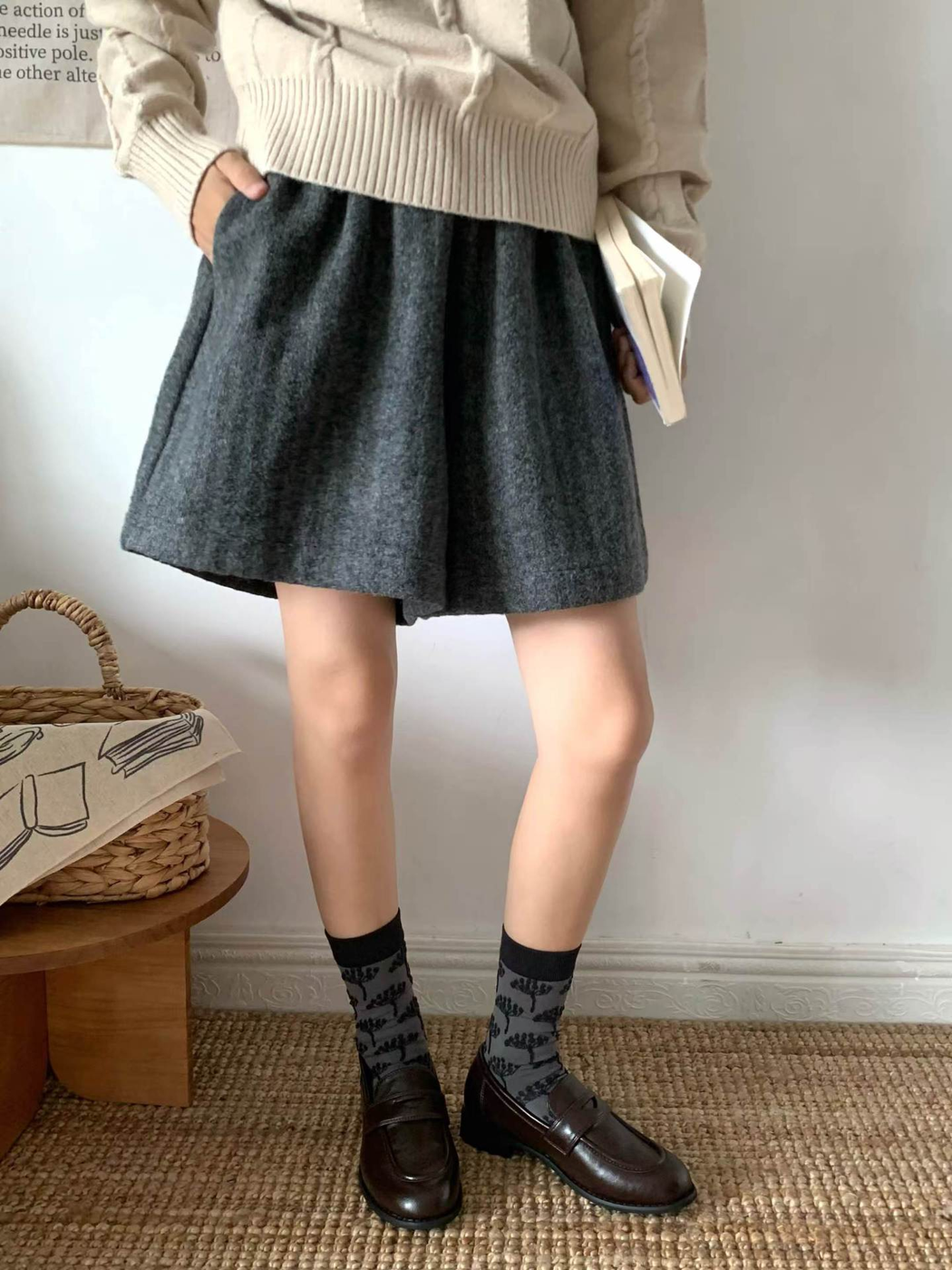 Gray tree-pattern crew socks styled with dark loafers