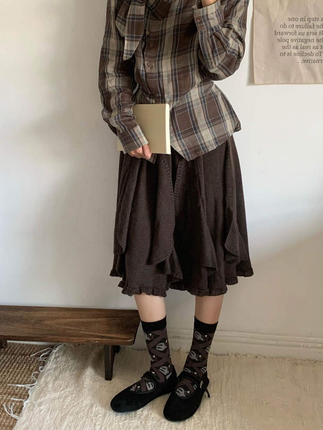 Leaf-lattice crew socks styled with a brown skirt and black flats