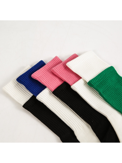 Close-up of contrasting ribbed cuffs in assorted colors
