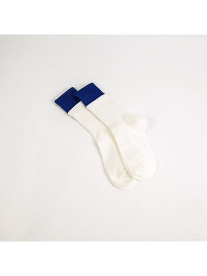 White crew socks with contrasting blue ribbed cuffs