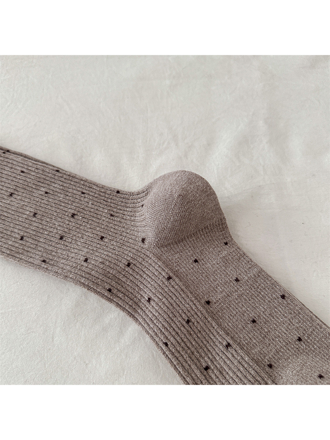 Close-up of the ribbed sock body and shaped heel