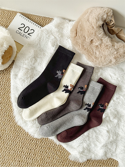 Five colors of dog-walking motif crew socks displayed together