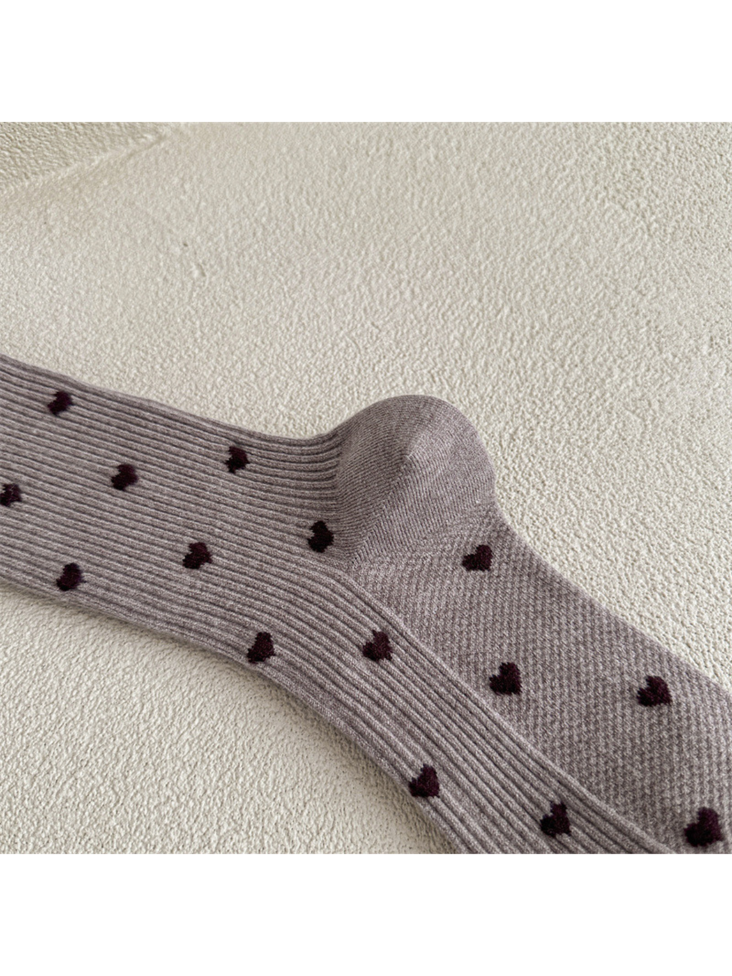 Close-up of the shaped heel and heart pattern