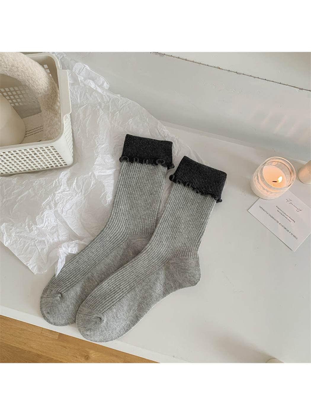 Light gray ribbed crew socks with dark folded ruffle cuffs