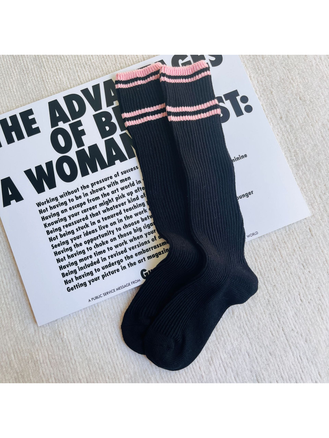Black ribbed knee-high socks with pink cuff and shaft stripes