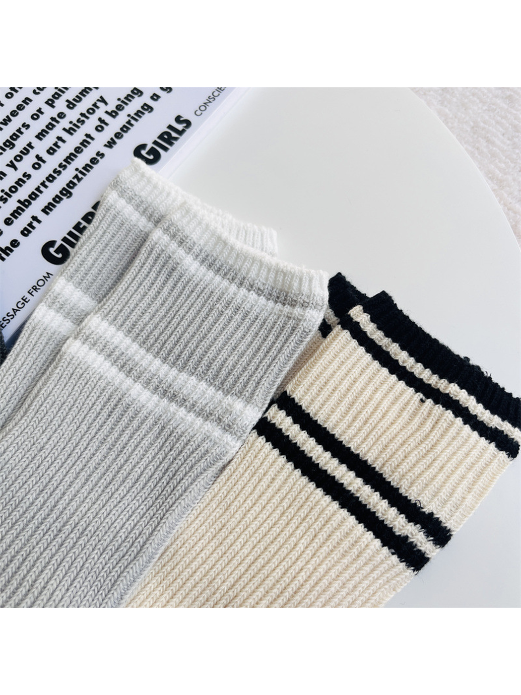 Close-up of contrasting stripes around the ribbed sock cuffs