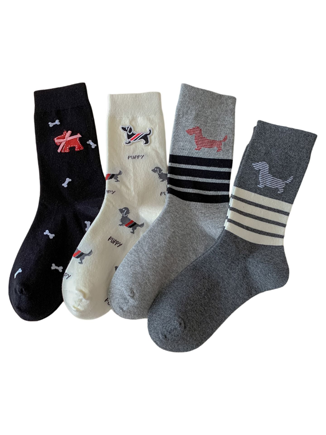 Four dog-motif crew sock styles in black, ivory, dark gray and light gray