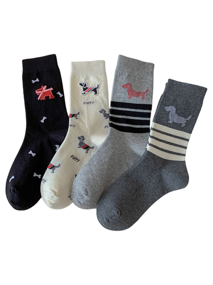 Four dog-motif crew sock styles in black, ivory, dark gray and light gray